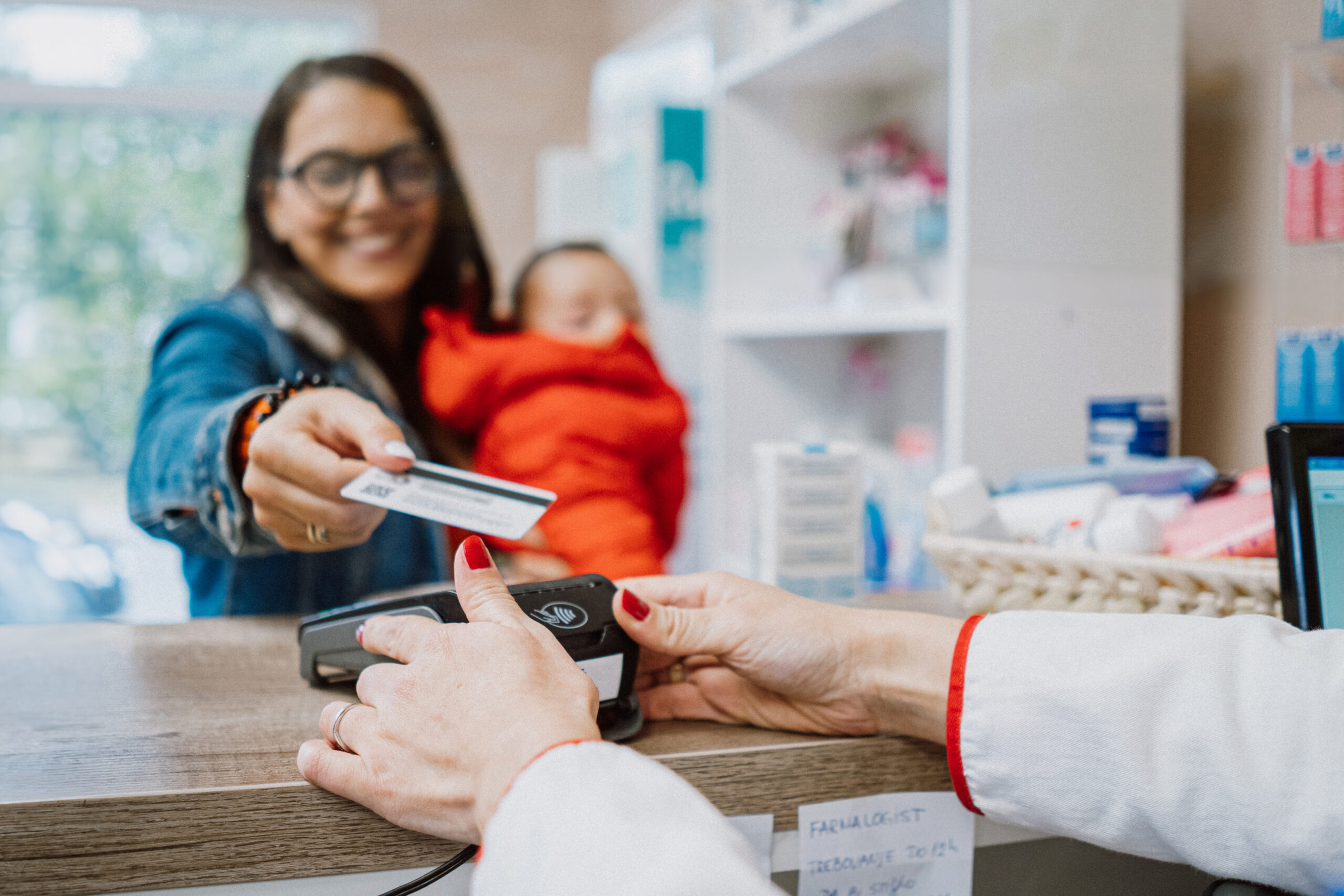 Woman looking at laptop and cheering